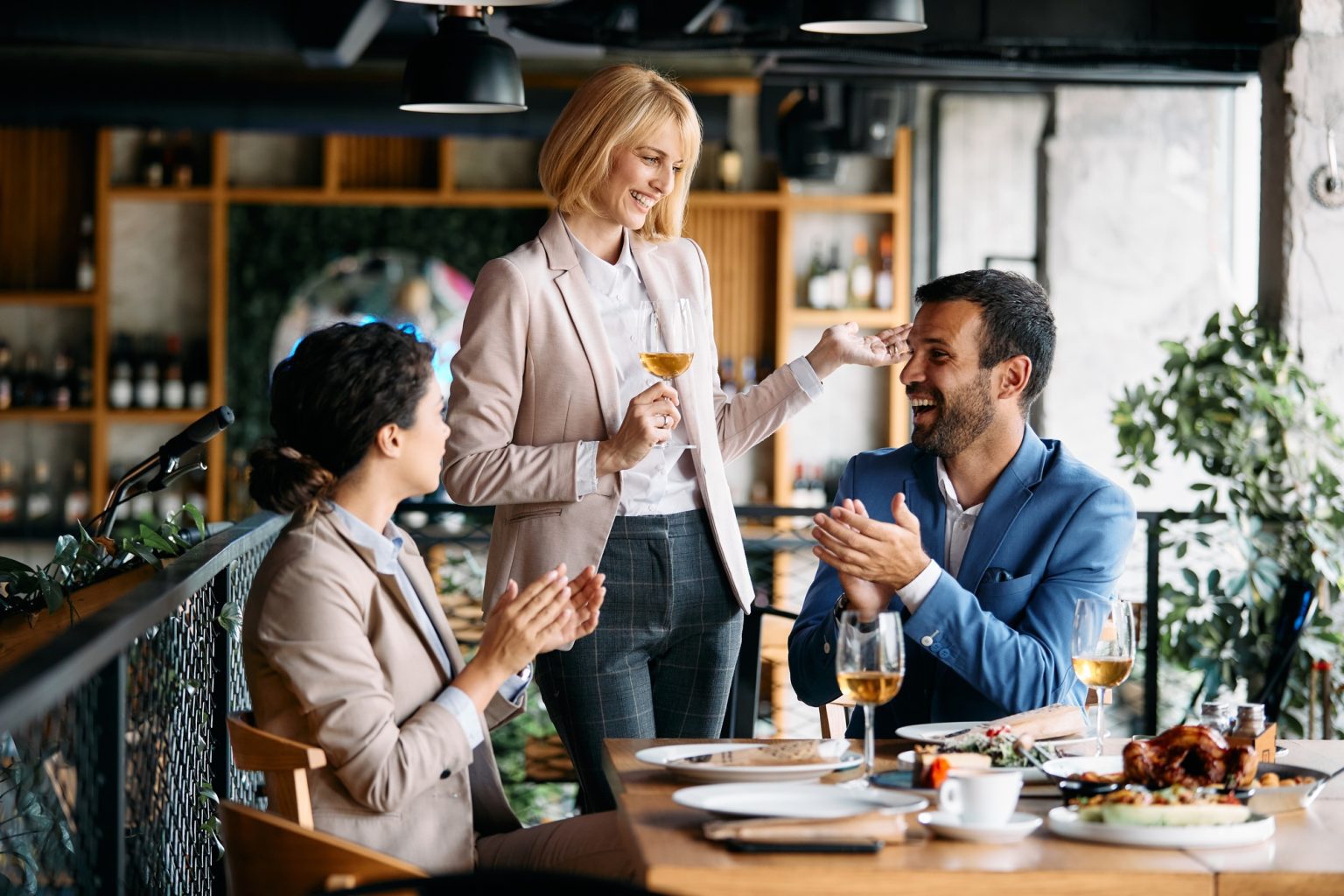 Business professionals celebrating success